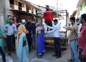 Distribution of food items in Dungra village of Vapi district in Gujarat on 28th Mar 2020 