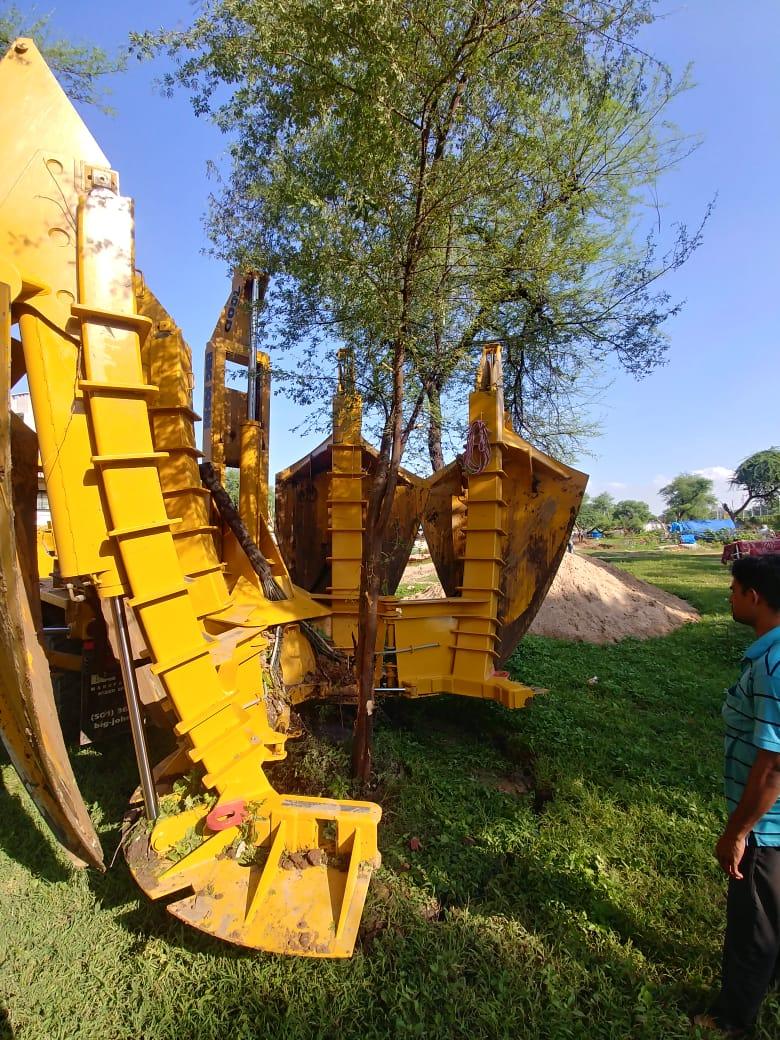 Tree Spade transplanting trees in Ahmedabad area