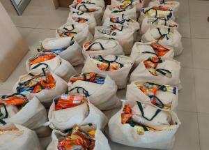 Food items being delivered to underprivileged class of Vapi area in Gujarat