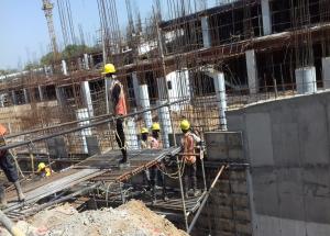 Concreting of retaining wall in A Block Parallel to Railway track in progress at Sabarmati hub terminal on 26 may 2020