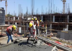Concreting of retaining wall in A Block Parallel to Railway track in progress at Sabarmati hub terminal on 26 may 2020