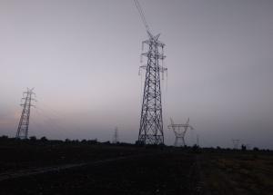 Stringing work in progress in 400kv GPEC Kasor line in Bharuch district on 01 june 2020
