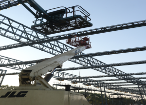 Two machines working in close sync at one of the construction sites in Ahmedabad