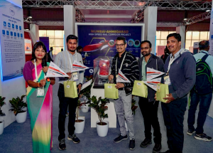 Participants engage in an interactive quiz game at the NHSRCL stall during the Vibrant Gujarat 2024_2
