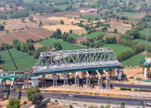 First 100 m Span of a 2 X 100 m long Steel Bridge launched over NH - 48 in Gujarat for Bullet Train Project