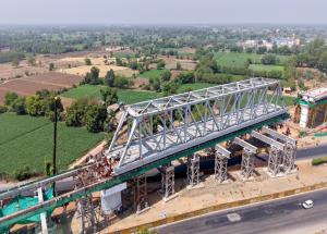 First 100 m Span of a 2 X 100 m long Steel Bridge launched over NH - 48 in Gujarat for Bullet Train Project