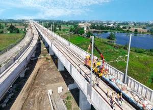 OHE electrification works progressing along the Mumbai Ahmedabad Bullet Train corridor