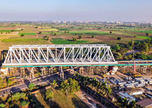 130 m span of a 230 m long  steel bridge launched over NH-64 & Indian Railway tracks for Bullet Train Project