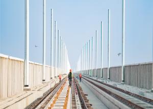 Overhead electrification (OHE) work in progress at Anand district, Gujarat