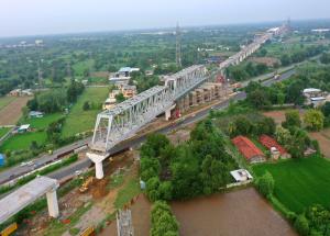 Second 100 m Span of a 2 x 100 m long Steel Bridge Launched over NH - 48 in Gujarat for Mumbai-Ahmedabad Bullet Train Project This is the ninth steel bridge completed for the project